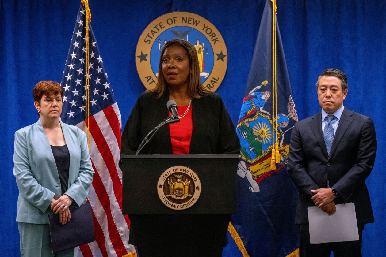 New York Attorney General Letitia James, center, discusses the findings Tuesday of an independent investigation into accusations by multiple women that New York Governor Andrew Cuomo sexually harassed them.